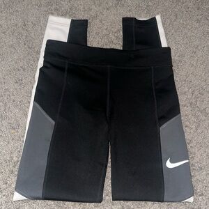 Black, white and grey Nike leggings